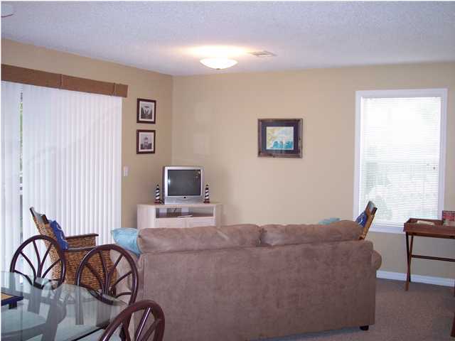 11 Beachside Drive, Unit 1211 Santa Rosa Beach, FL 32459 - Photo 4 of 15 a living room with furniture and a window