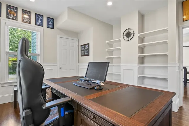 a view of workspace with wooden floor