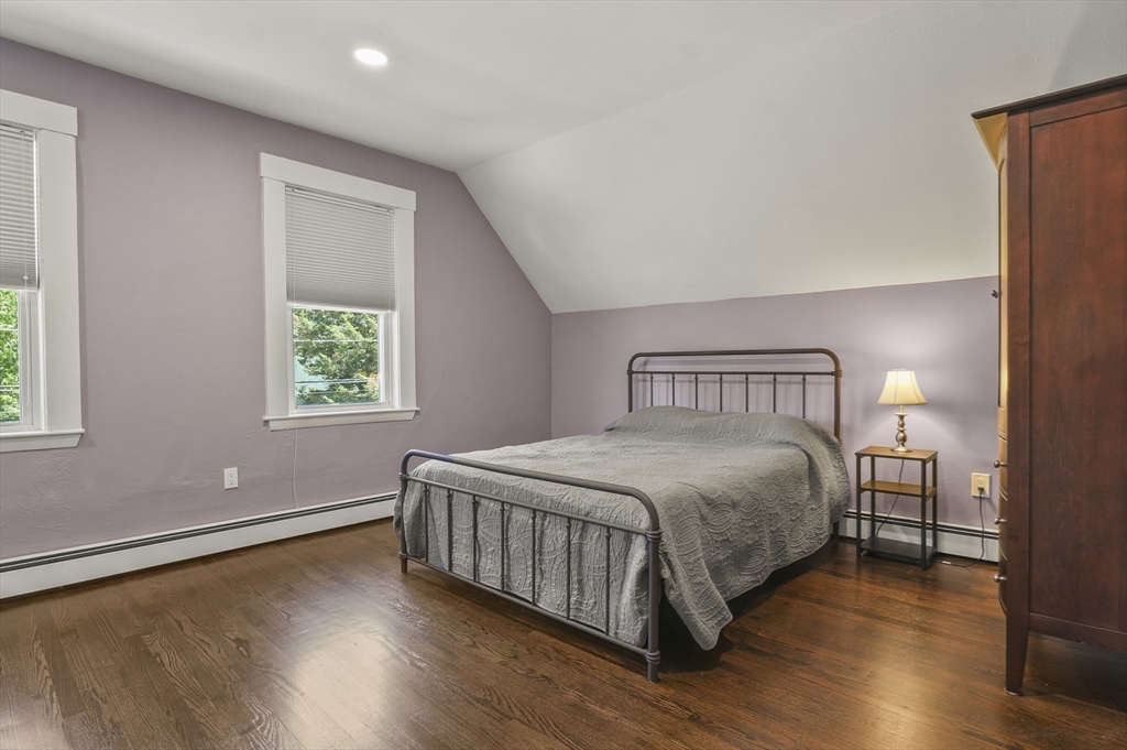 5 Waban Street Natick, MA 01760 - Photo 20 of 32 a bedroom with a bed and a window