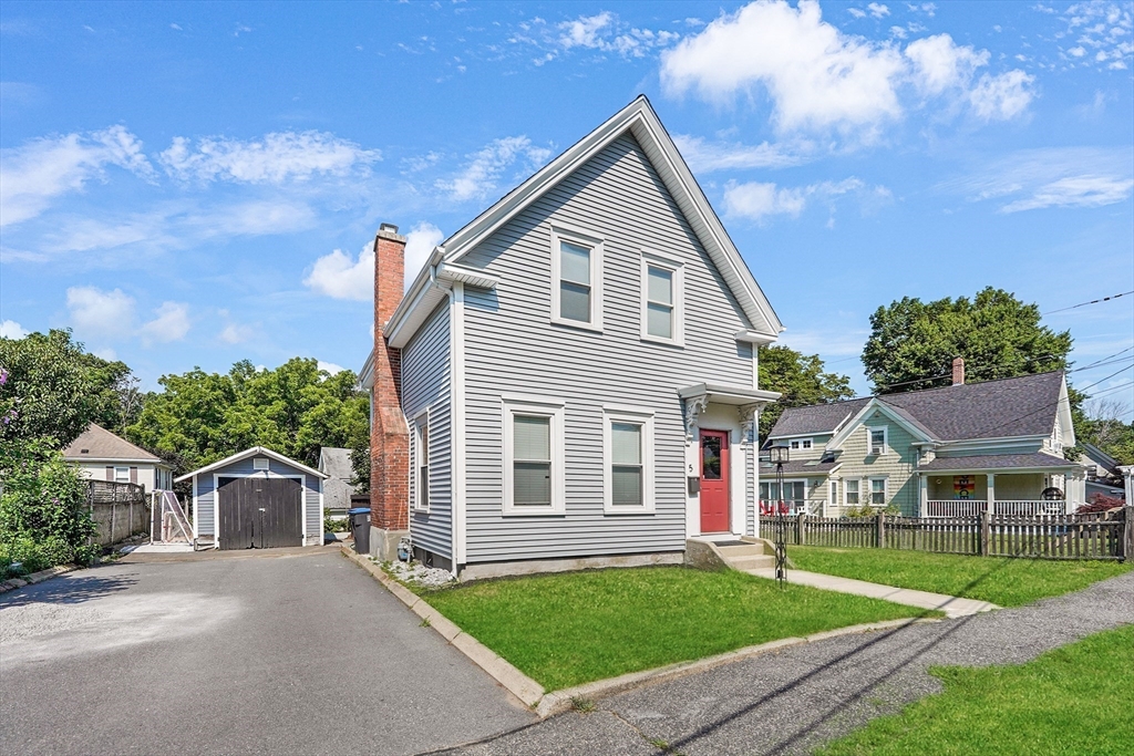 5 Waban Street Natick, MA 01760 - Photo 2 of 32 a front view of a house with a yard