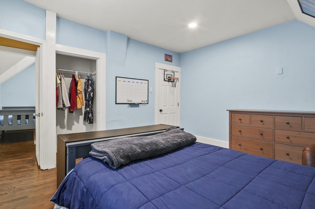 5 Waban Street Natick, MA 01760 - Photo 23 of 32 a bedroom with a bed and a dresser