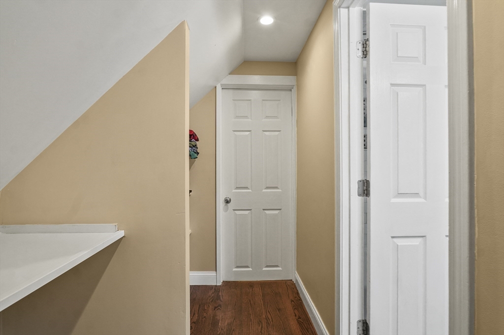 5 Waban Street Natick, MA 01760 - Photo 27 of 32 a view of a hallway with wooden floor