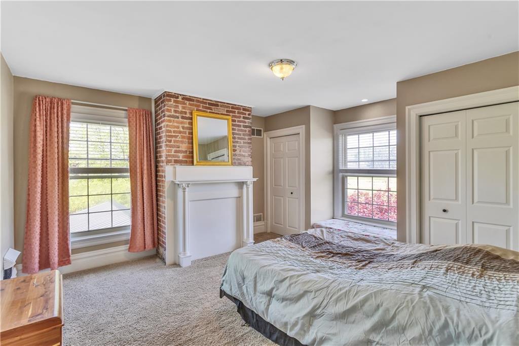 1226 Mayview Road Pittsburgh, PA 15241 - Photo 29 of 42 A truly special space featuring a decorative fireplace and a cozy window bench perfect for reading, relaxing, or enjoying quiet moments.