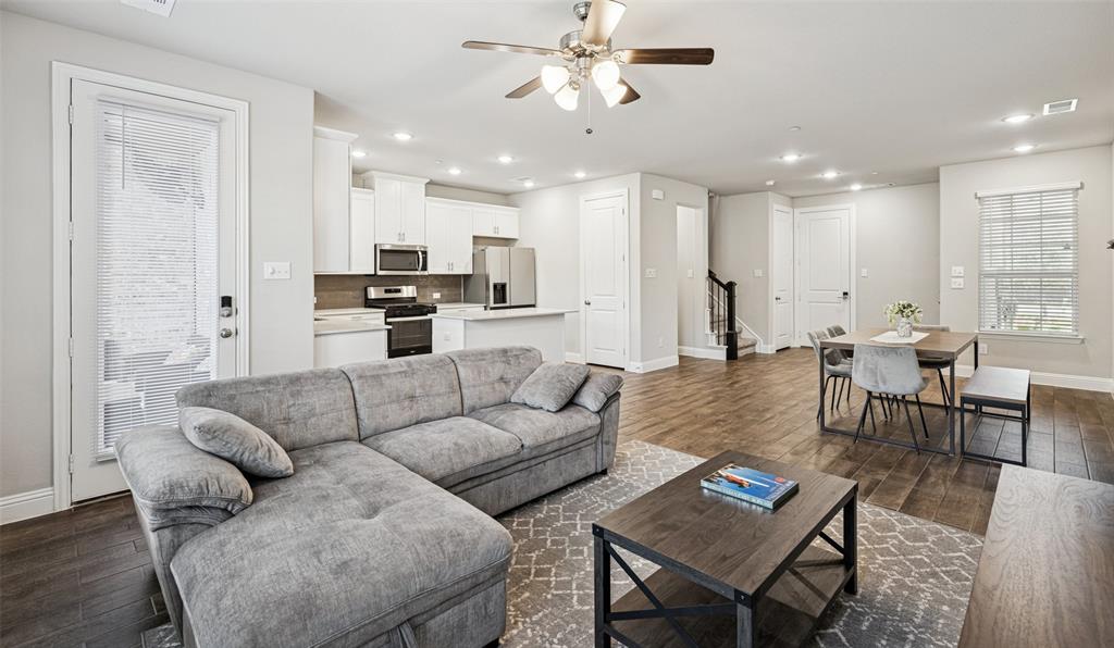 3073 Hamilton Street Plano, TX 75075 - Photo 11 of 30 a living room with furniture kitchen view and a dining table