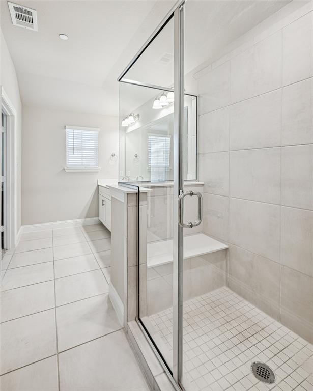 3073 Hamilton Street Plano, TX 75075 - Photo 20 of 30 a bathroom with a sink and shower