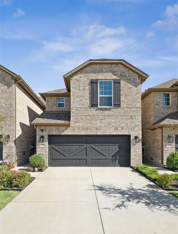3073 Hamilton Street Plano, TX 75075 - Photo 2 of 30 a front view of a house with a yard