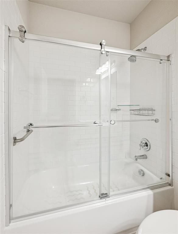 3073 Hamilton Street Plano, TX 75075 - Photo 26 of 30 a bathroom with a shower and a bathtub