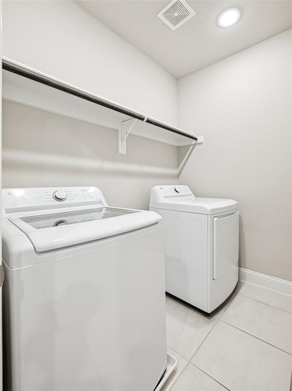 3073 Hamilton Street Plano, TX 75075 - Photo 28 of 30 a utility room with dryer and washer