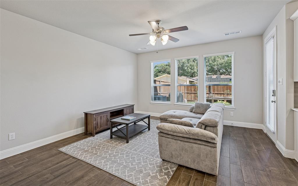 3073 Hamilton Street Plano, TX 75075 - Photo 8 of 30 a living room with furniture and a large window