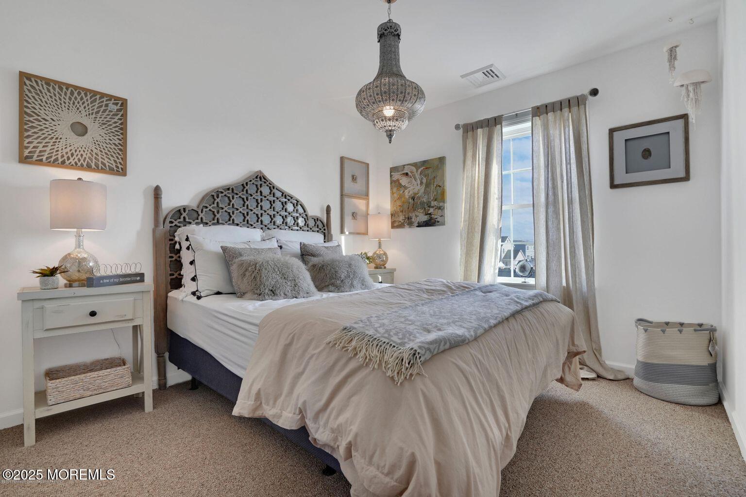 304 6th Avenue Seaside Heights, NJ 08751 - Photo 11 of 20 a spacious bedroom with a bed and window