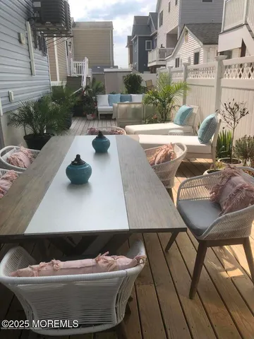 a view of swimming pool with outdoor seating