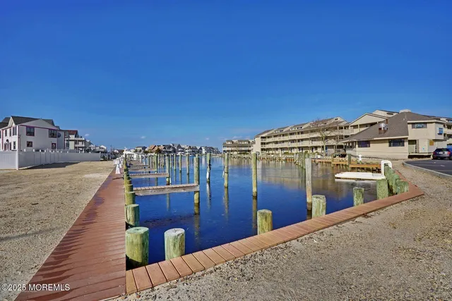 a view of a balcony with two chairs