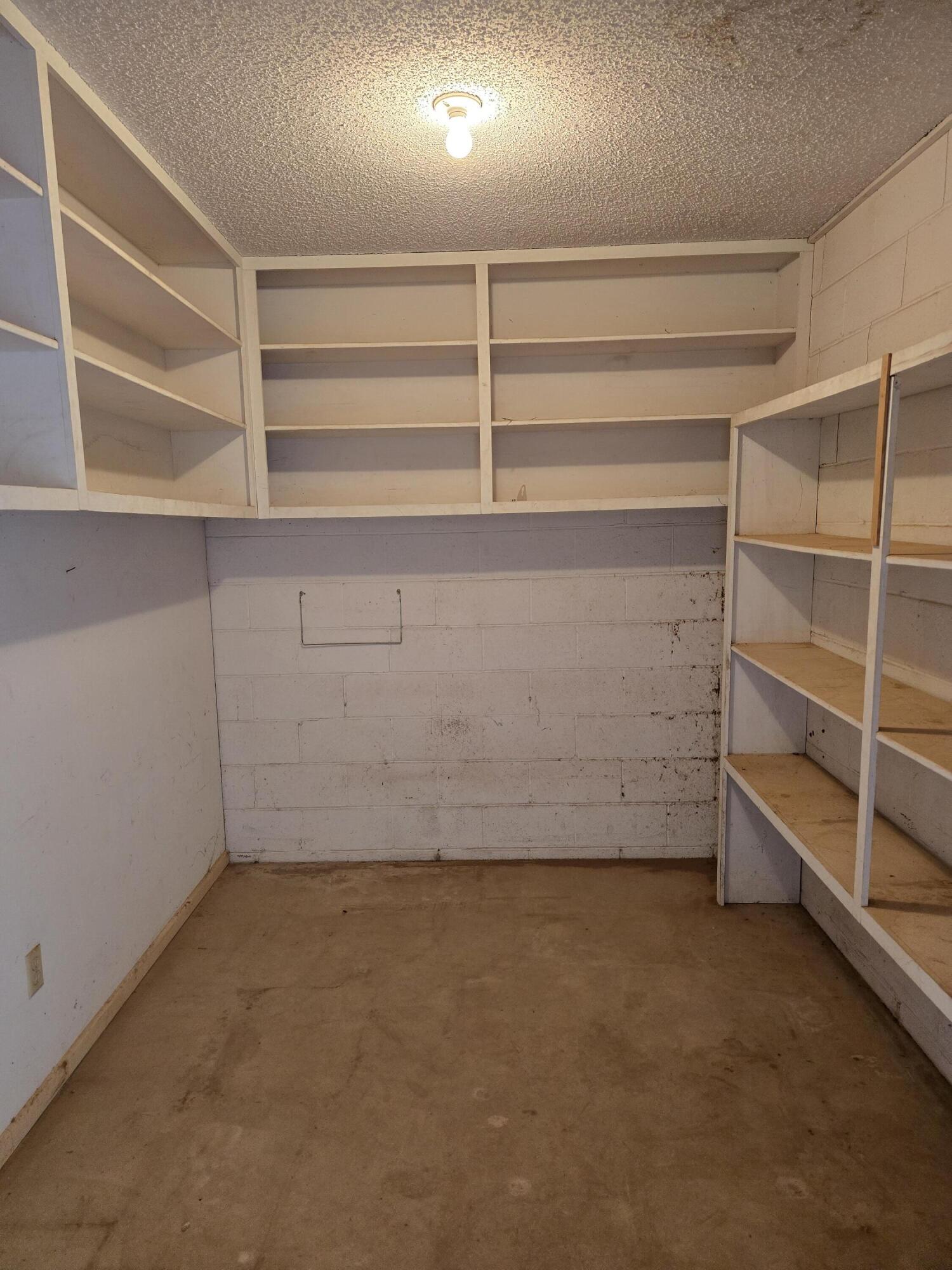 2229 South 6th Street Lamesa, TX 79331 - Photo 26 of 27 a view of an empty room with empty racks