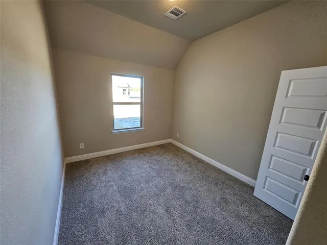 a view of a kitchen with a sink