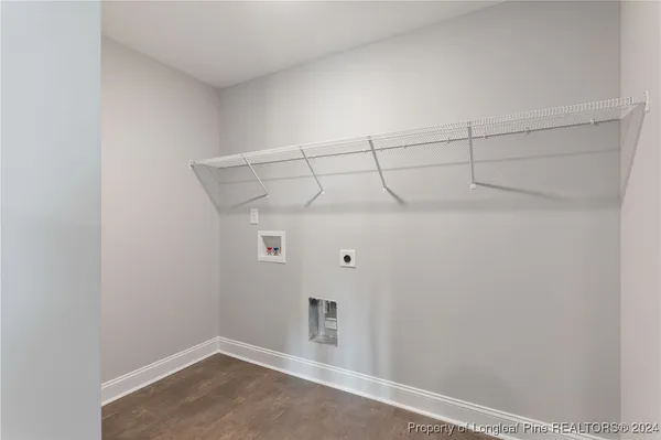 a front view of a house with a yard and porch