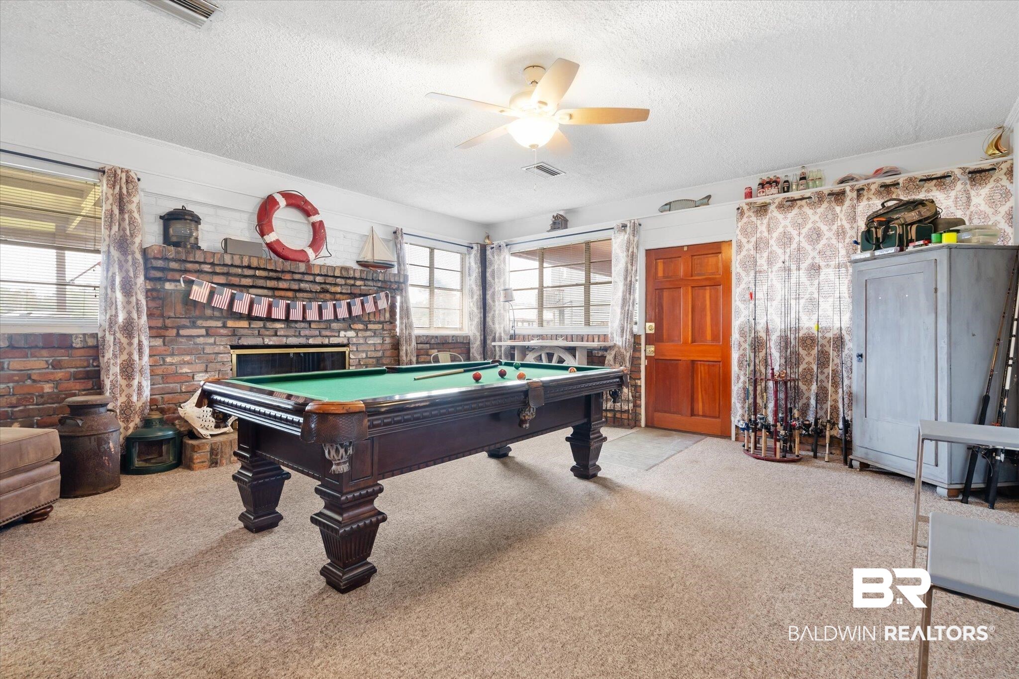 4570 Benson Road Mobile, AL 36619 - Photo 9 of 34 Recreation room with carpet floors and a healthy amount of sunlight