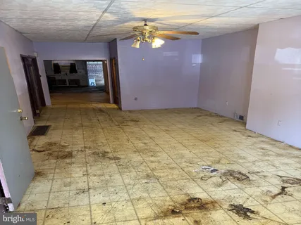 a view of a livingroom with a furniture