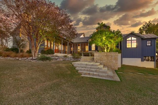 a kitchen with granite countertop a sink and dishwasher