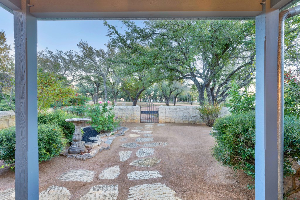 1129 Triple Creek Road Fredericksburg, TX 78624 - Photo 18 of 78 a view of a back yard from a balcony