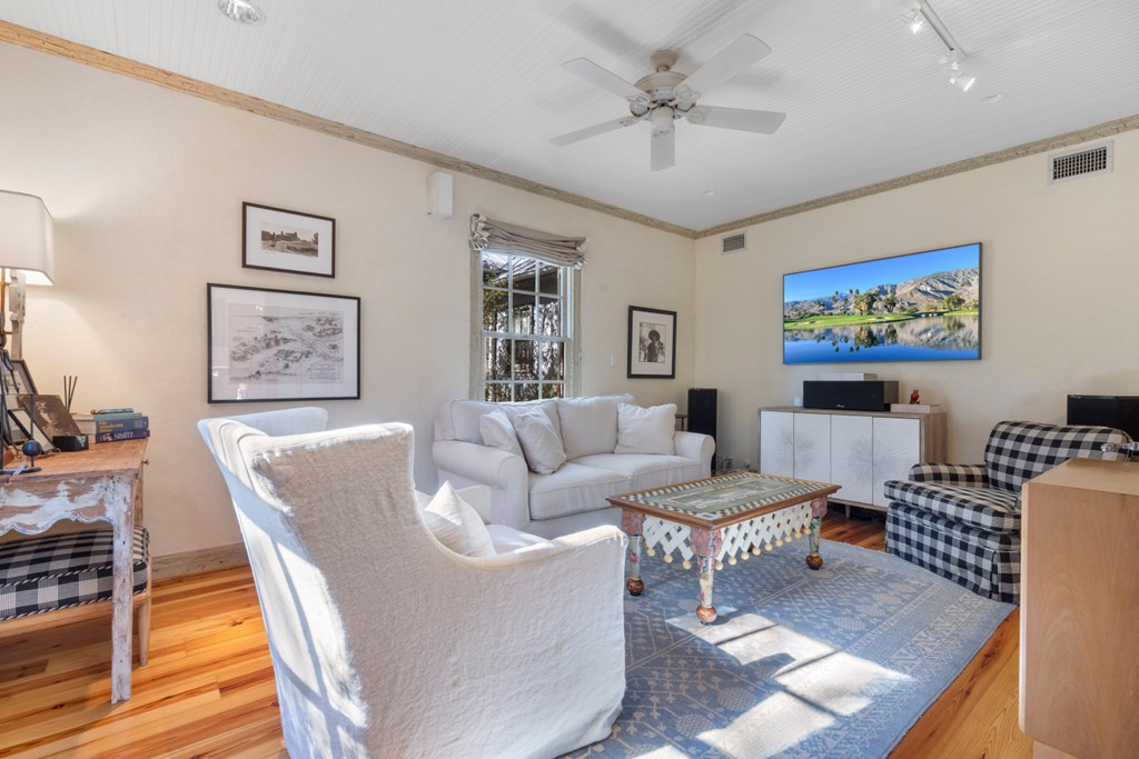 1129 Triple Creek Road Fredericksburg, TX 78624 - Photo 29 of 78 a living room with furniture and a large window