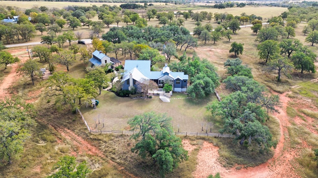 1129 Triple Creek Road Fredericksburg, TX 78624 - Photo 3 of 78 an aerial view of a house with a yard