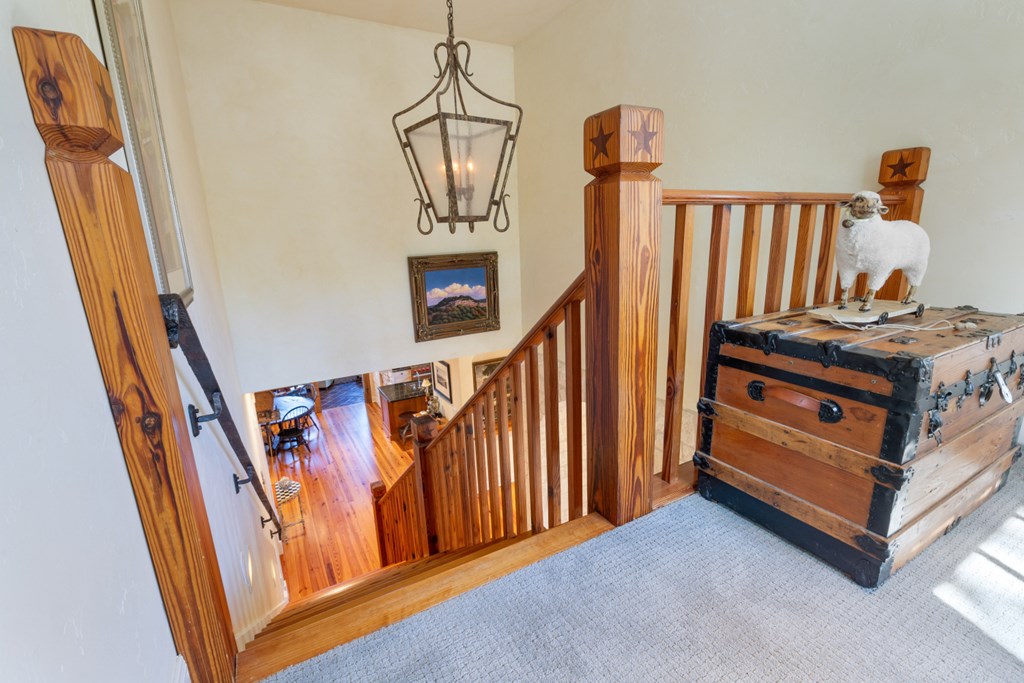1129 Triple Creek Road Fredericksburg, TX 78624 - Photo 41 of 78 a view of a hallway with stairs