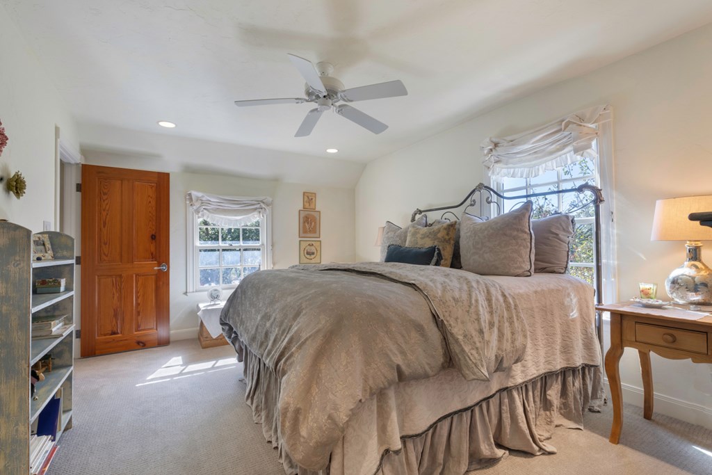 1129 Triple Creek Road Fredericksburg, TX 78624 - Photo 42 of 78 a bedroom with a bed and a window