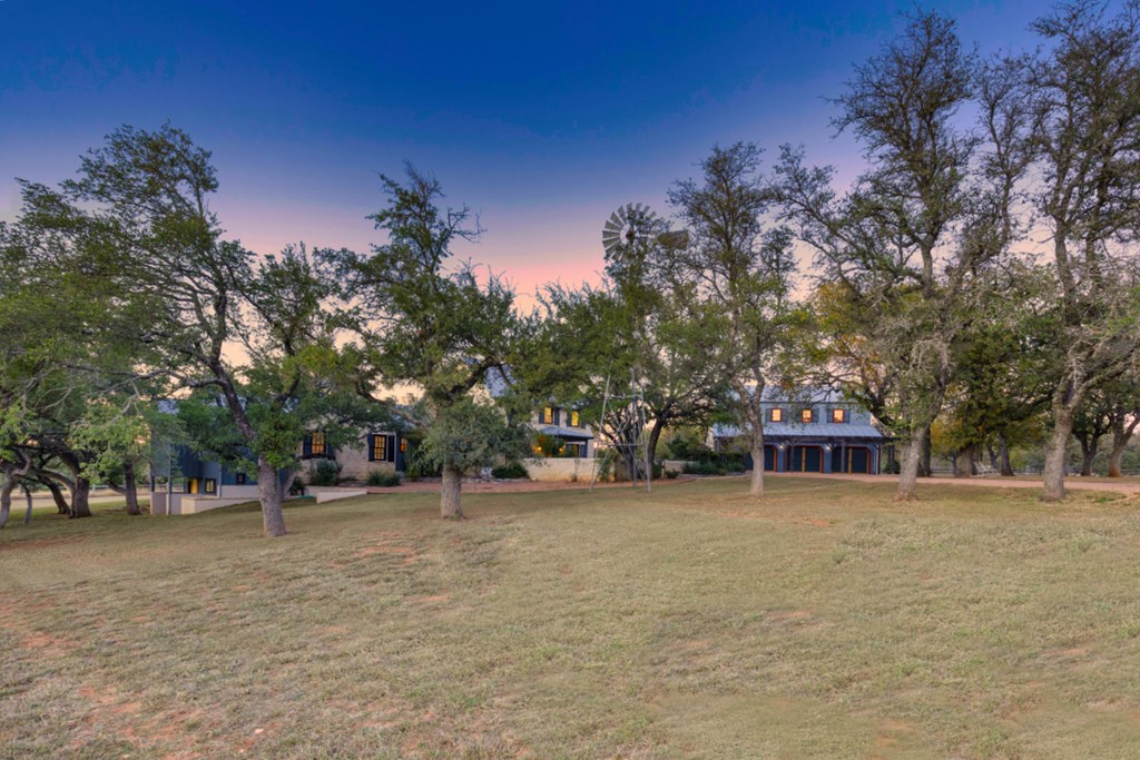 1129 Triple Creek Road Fredericksburg, TX 78624 - Photo 64 of 78 a view of a house with a yard