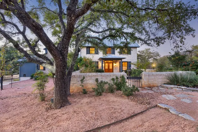 a house view with a garden space