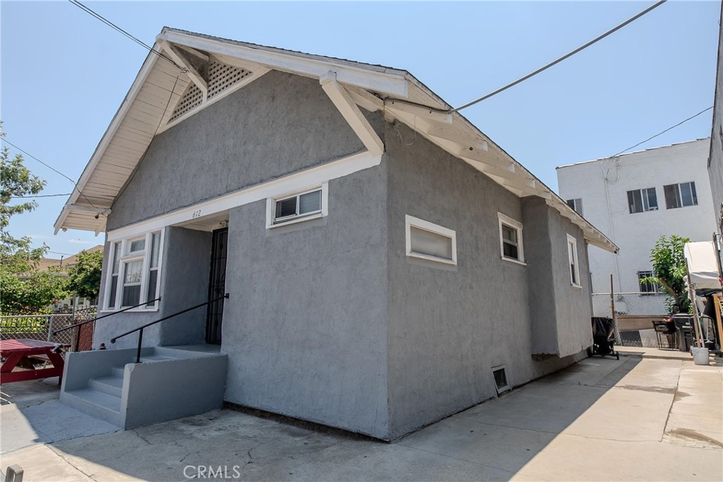 2500 Trinity Street Los Angeles, CA 90011 - Photo 12 of 12 a backyard of a house with outdoor seating