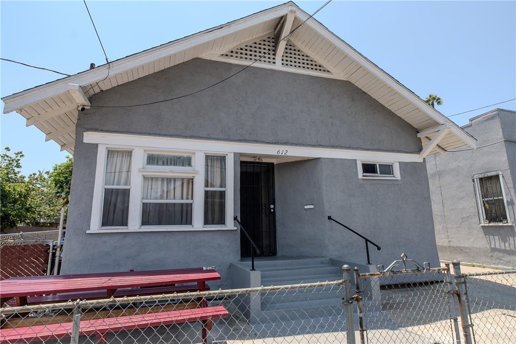 2500 Trinity Street Los Angeles, CA 90011 - Photo 6 of 12 a front view of a house with garage