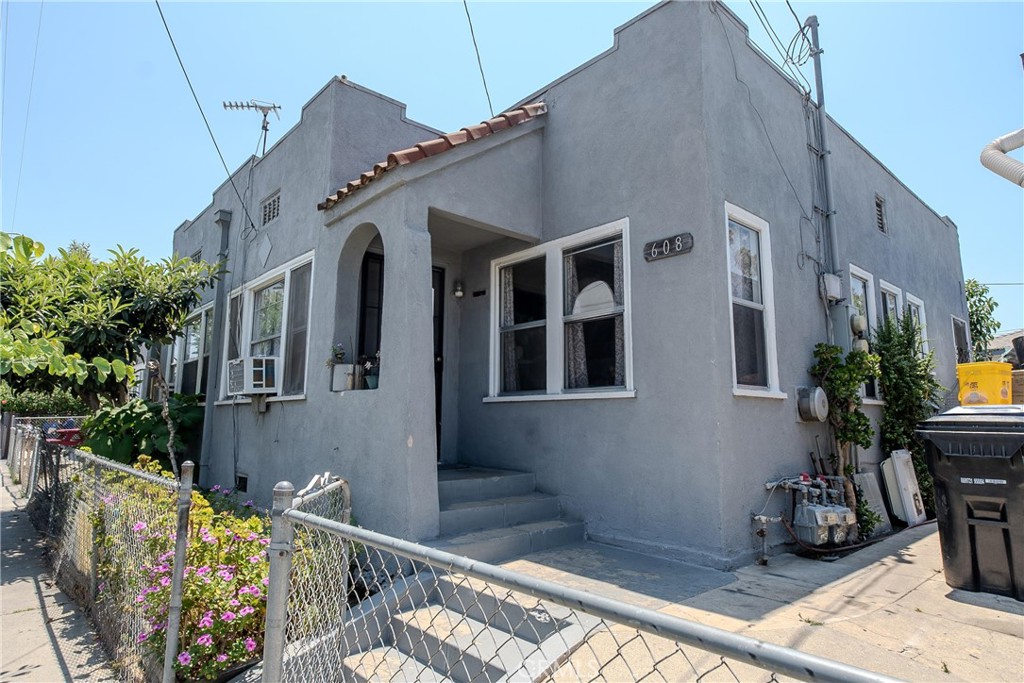 2500 Trinity Street Los Angeles, CA 90011 - Photo 9 of 12 a front view of a house with patio