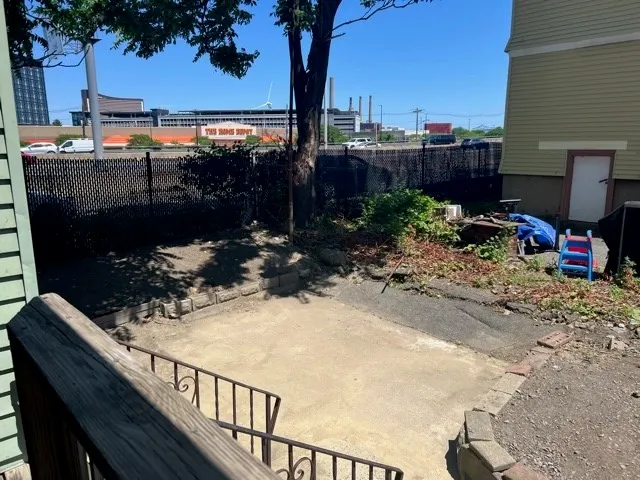 a view of a street with sitting area