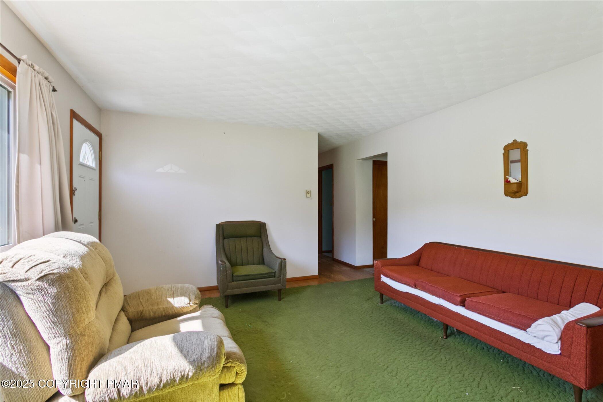 145 Sweet Arrow Lake Road Pine Grove, PA 17963 - Photo 13 of 38 a living room with furniture and a window
