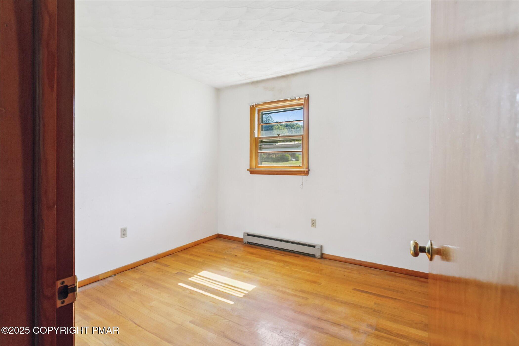 145 Sweet Arrow Lake Road Pine Grove, PA 17963 - Photo 20 of 38 a view of a room with a wooden floor