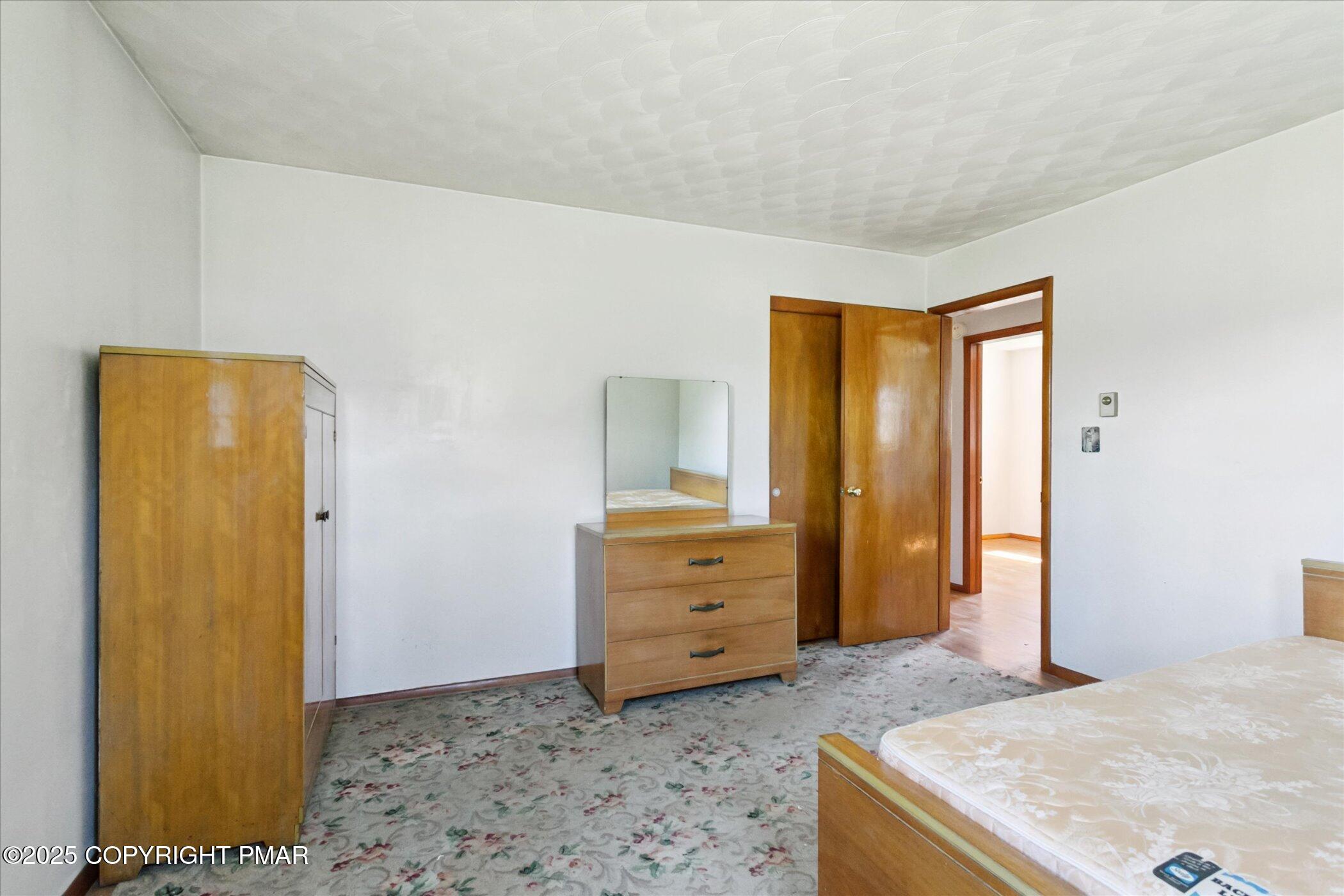 145 Sweet Arrow Lake Road Pine Grove, PA 17963 - Photo 26 of 38 a room with a dresser and a mirror