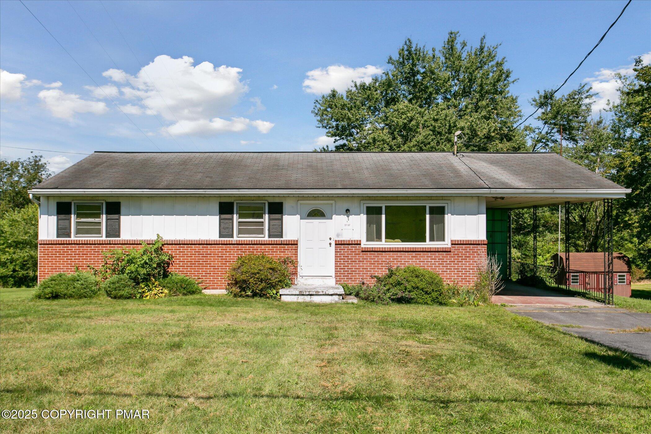 145 Sweet Arrow Lake Road Pine Grove, PA 17963 - Photo 5 of 38 front view of a house with a yard