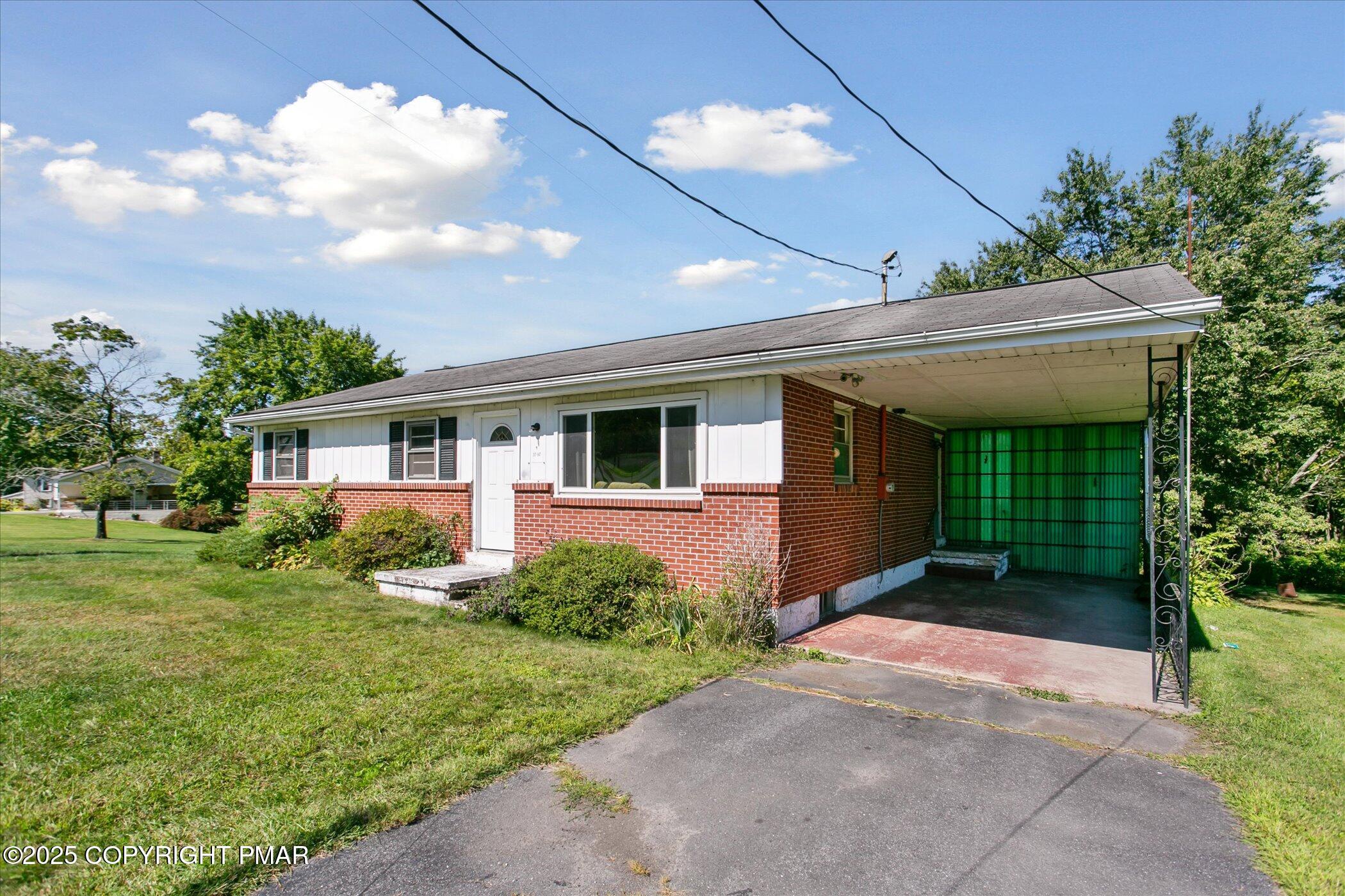 145 Sweet Arrow Lake Road Pine Grove, PA 17963 - Photo 7 of 38 a front view of house with yard and green space