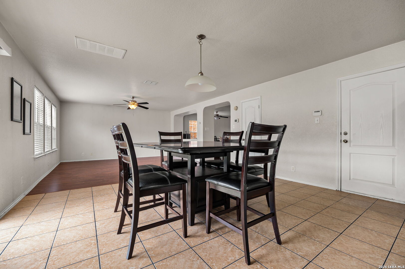 7207 Avery Road Live Oak, TX 78233 - Photo 15 of 32 a view of a dining room with furniture