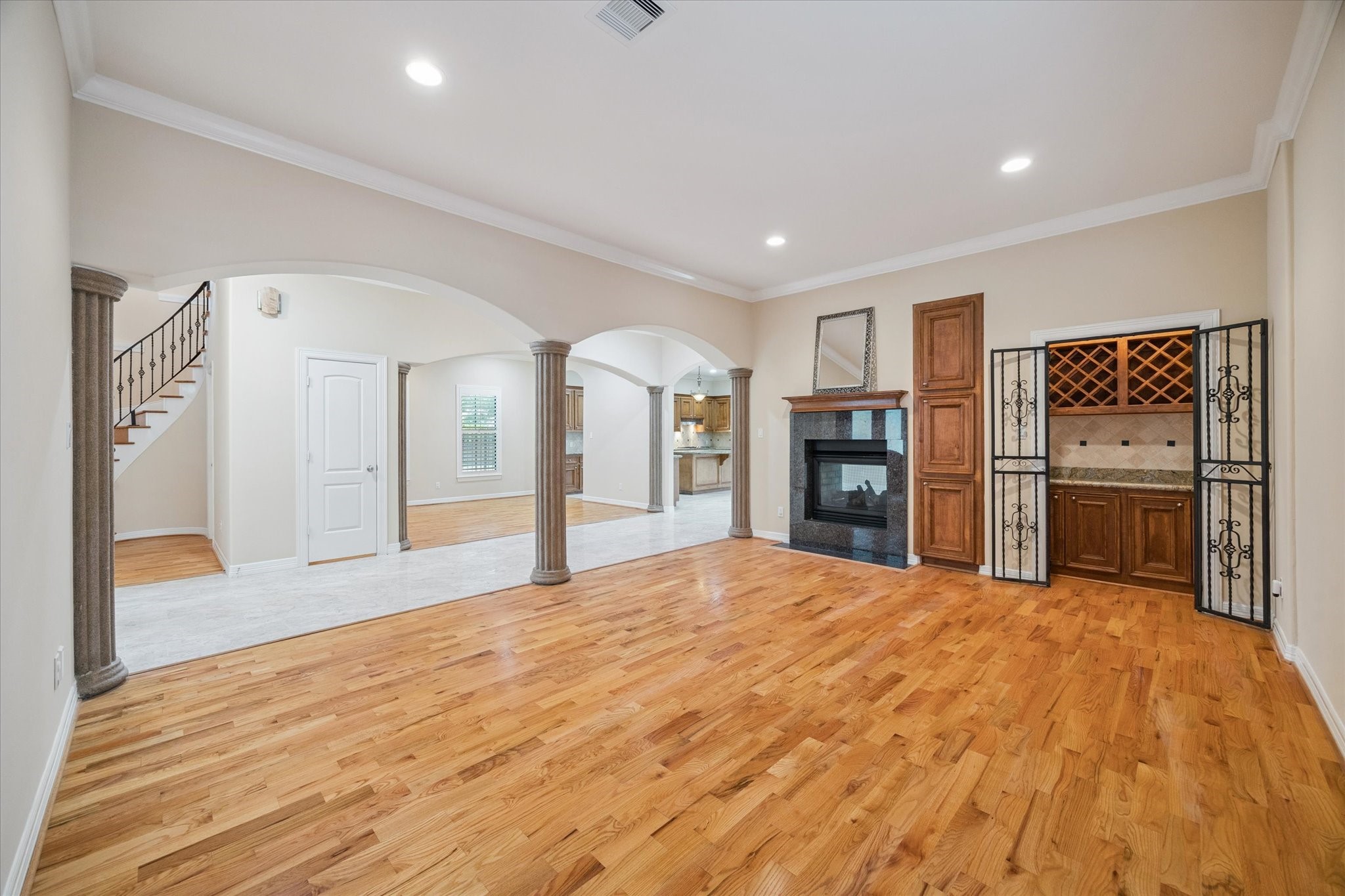 2601 Talbott Street Houston, TX 77005 - Photo 15 of 25 a large bedroom with a bed and a refrigerator