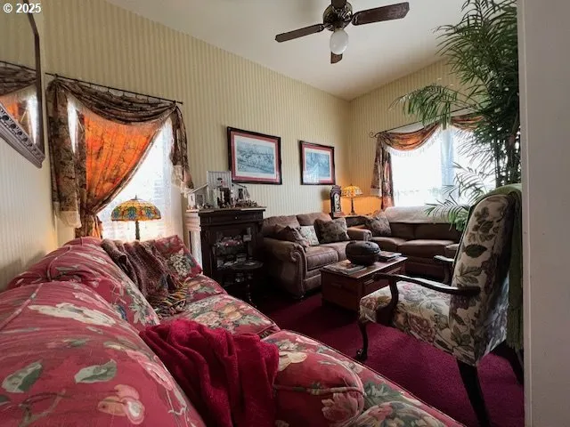 a living room with furniture and a window