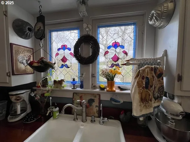 a view of a workspace with furniture and toys