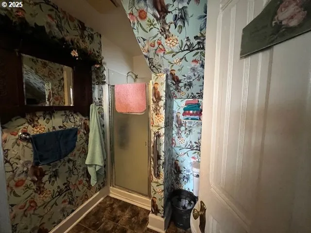 a storage room with washer and dryer