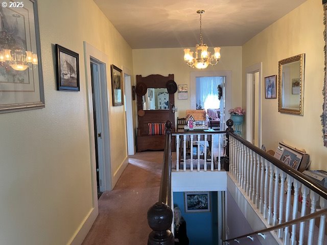 18 South Collier Street Coquille, OR 97423 - Photo 23 of 48 a view of a livingroom with furniture stairs