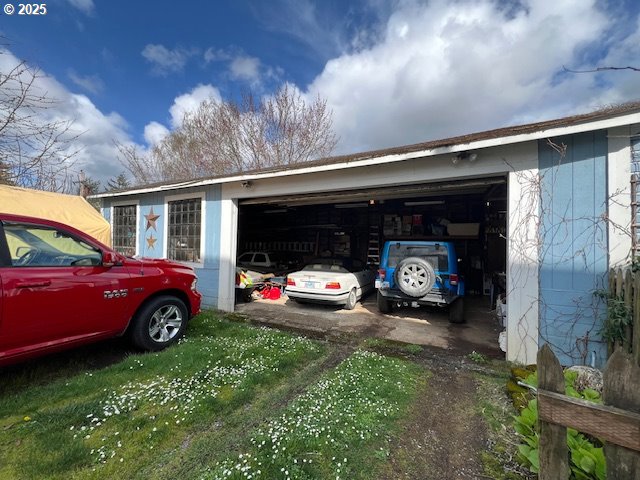 18 South Collier Street Coquille, OR 97423 - Photo 43 of 48 a car parked in front of a house