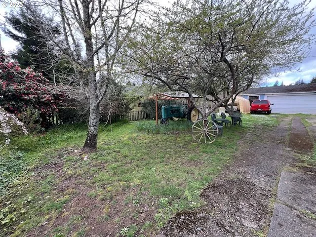 a backyard of a house with lots of green space