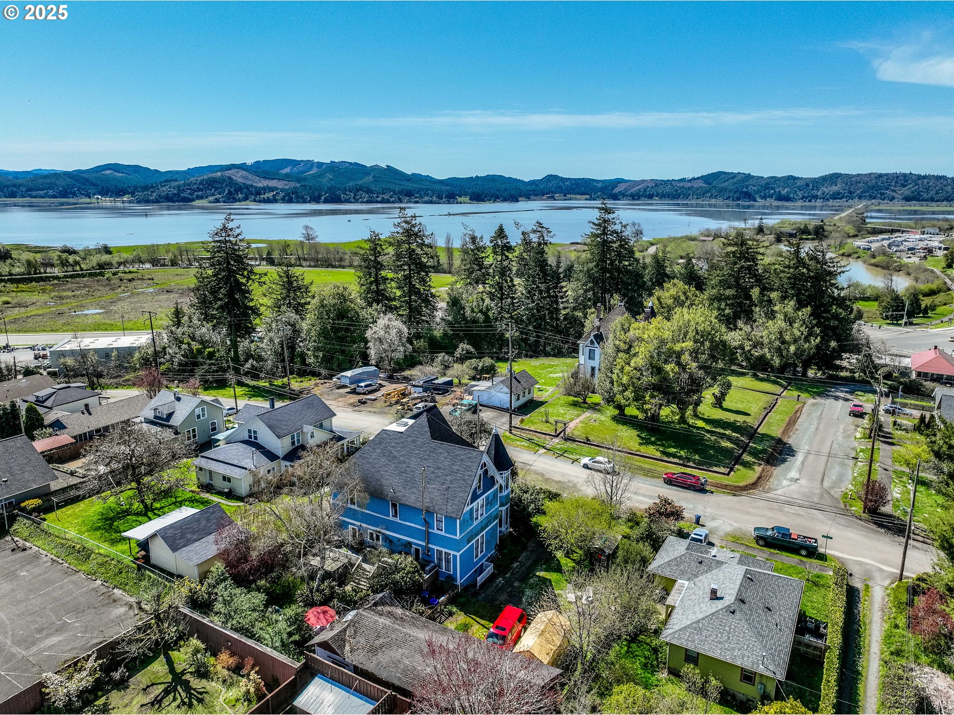 18 South Collier Street Coquille, OR 97423 - Photo 48 of 48 a view of a city with mountains in the background