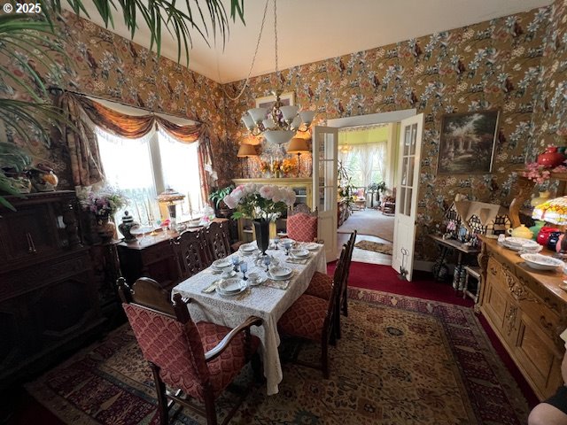 18 South Collier Street Coquille, OR 97423 - Photo 8 of 48 a view of a dinning tables and chairs in a patio