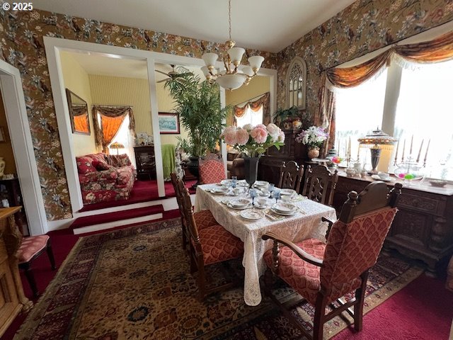 18 South Collier Street Coquille, OR 97423 - Photo 9 of 48 a view of a dining room with furniture window and outside view