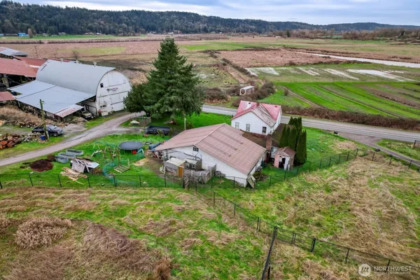 an aerial view of a house with garden space and outdoor space